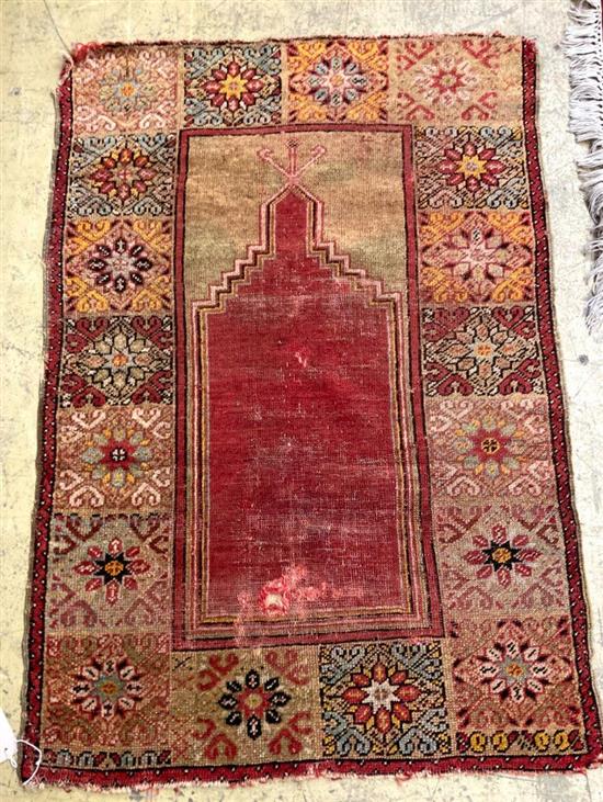 A Caucasian red ground prayer rug, 121 x 82cm